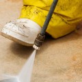 How strong does pressure washer remove paint from concrete?
